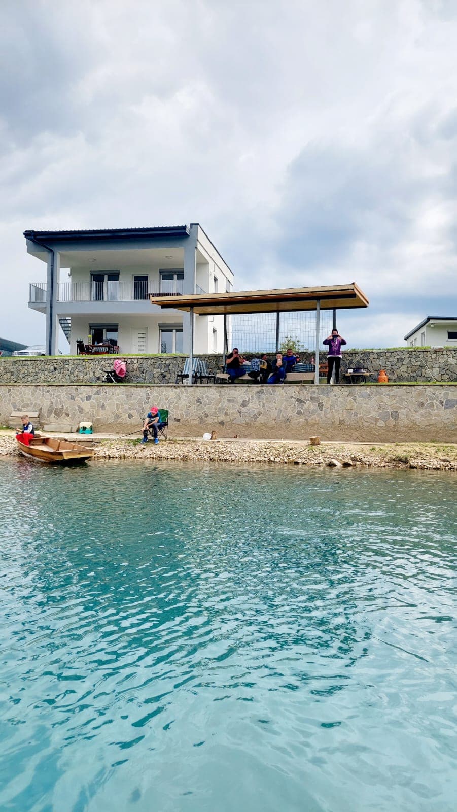 Sunlit Bosnian villa with pool and forest backdrop