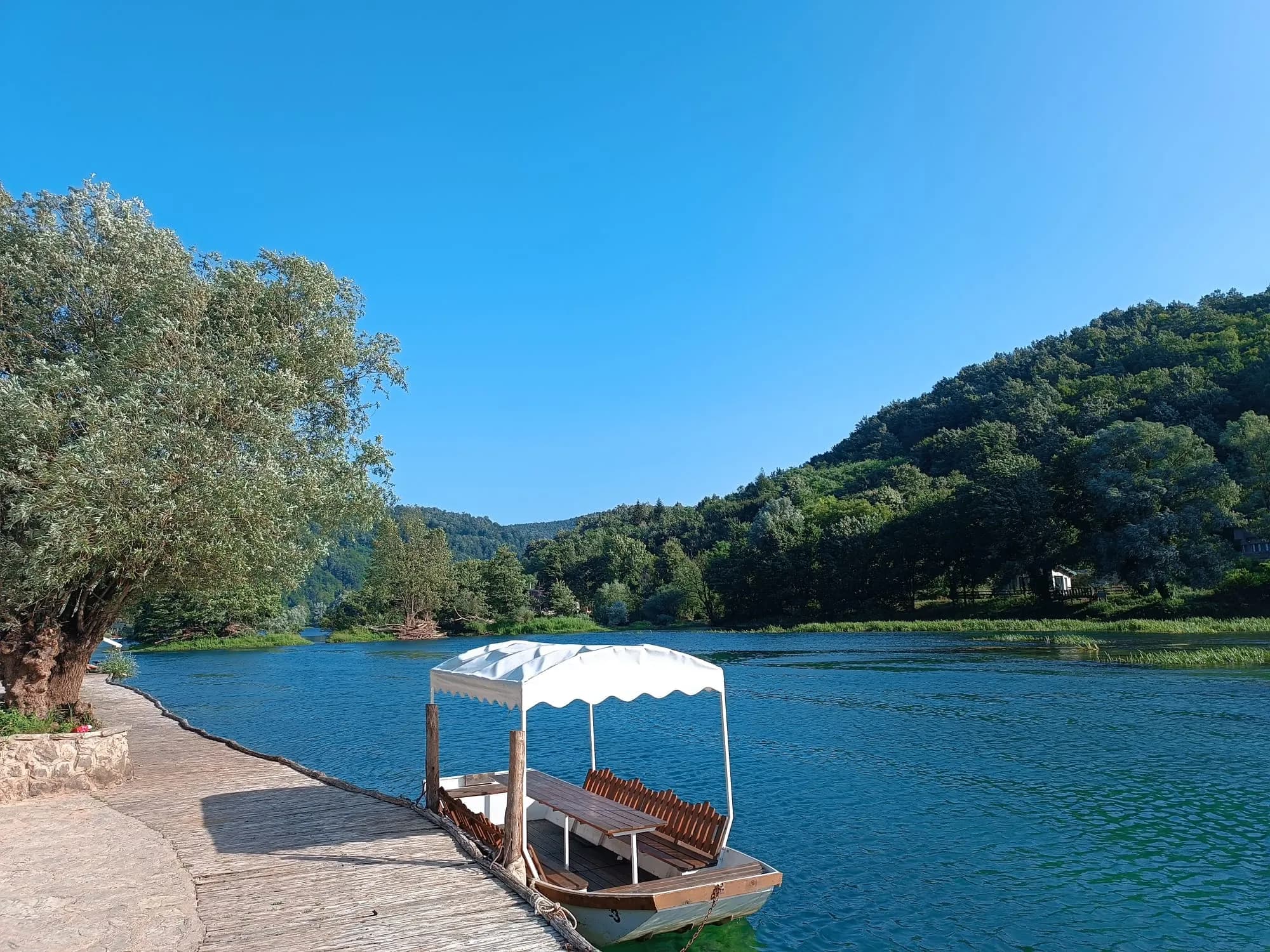 A peaceful boat on the Una River in Bosnia